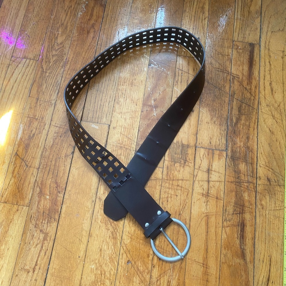 Brown checker hole belt.